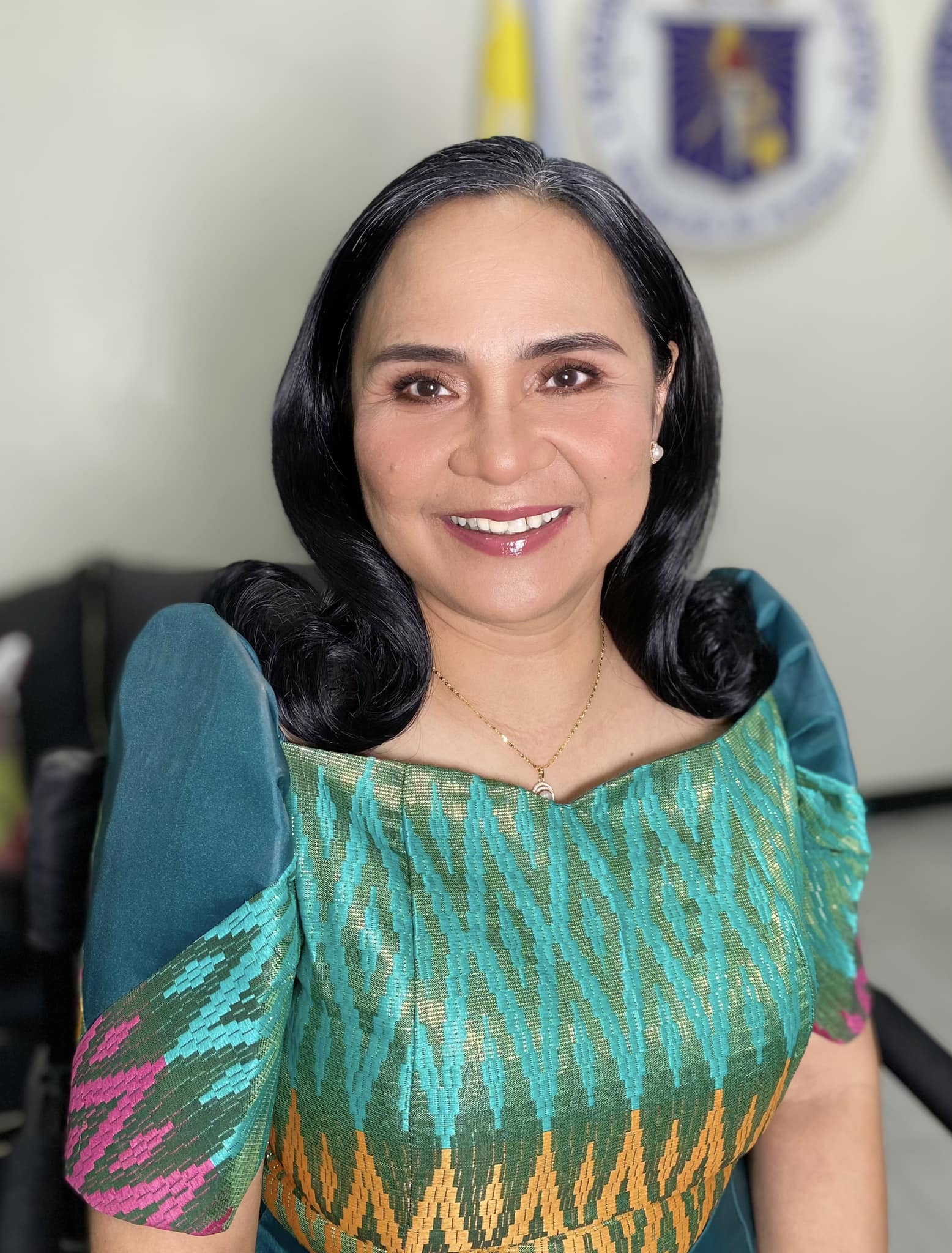 Portrait of Fatima R. Boado, CESO V, Schools Division Superintendent.